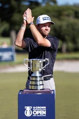 Australian Open Golf 2025 Final Results in Melbourne - 07 Dec 2025 Rasmus Neergaard-Petersen of Denmark is seen near the Australian Open Golf trophy. The 2025 Australian Open concluded with Denmark’s Rasmus Neergaard-Petersen securing the championship at 15-under after a tense final round at The Australian Golf Club. The tournament delivers a dramatic finish, with top international contenders pushing the leaderboard to the final holes. Large crowds gathered across the course as fans watch one of Australia’s premier golf events come to a close for the year. Melbourne Australia Copyright: xYexMyoxKhantx xSOPAxImagesx YeMyoKhant_47