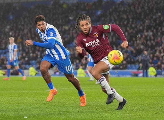 Brighton and Hove Albion v West Ham United, Premier League, Football, Amex Stadium, Brighton, UK - 07 Dec 2025 Georginio Rutter of Brighton and Ezra Mayers of West Ham United. Brighton Amex Stadium Brighton GBR, UK NEWSPAPERS OUT Copyright: xSeanxRyanx