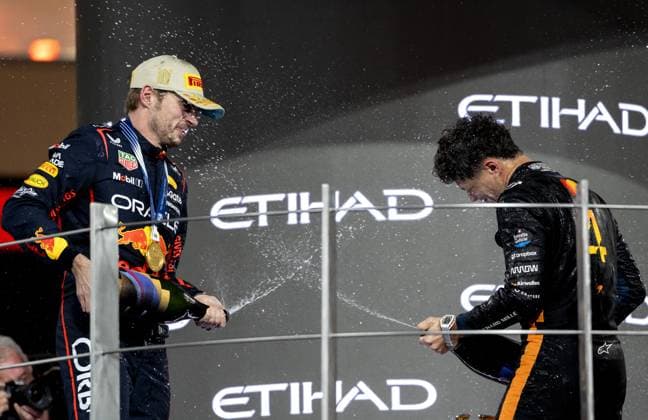 ABU DHABI - Max Verstappen (Red Bull Racing) on the podium at the Yas Marina Circuit after winning the Abu Dhabi Grand Prix. Lando Norris (m) (McLaren), who finished third, took the world title. ANP SANDER KONING xVIxANPxSportx xxANPxIVx 544188322 originalFilename: 544188322.jpg