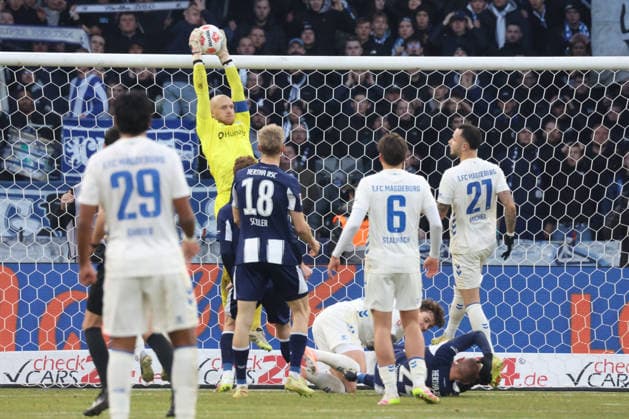 DEU, DFL, 2. FBL, Hertha BSC vs. 1: FC Magdeburg, 07.12.2025, Berliner Olympiastadion, Berlin, DEU, DFL, 2. FBL, Hertha BSC vs. 1: FC Magdeburg, im Bild Dominik Reimann (1.FC Magdeburg 1) DFL - regulations prohibit any use of Photographs as image sequences and or quasi-video