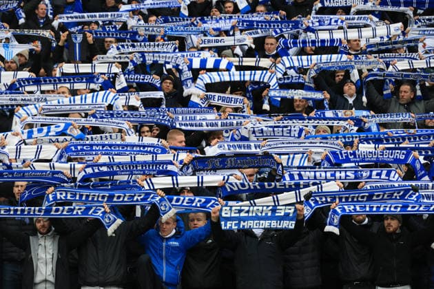 DEU, DFL, 2. FBL, Hertha BSC vs. 1: FC Magdeburg, 07.12.2025, Berliner Olympiastadion, Berlin, DEU, DFL, 2. FBL, Hertha BSC vs. 1: FC Magdeburg, im Bild Magdeburger-Fanblock DFL - regulations prohibit any use of Photographs as image sequences and or quasi-video