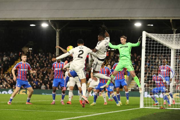 7th December 2025; Craven Cottage, Fulham, London, England; Premier League Football, Fulham versus Crystal Palace; Kenny Tete and Joachim Andersen of Fulham jumps for the incoming cross  KatiexChan