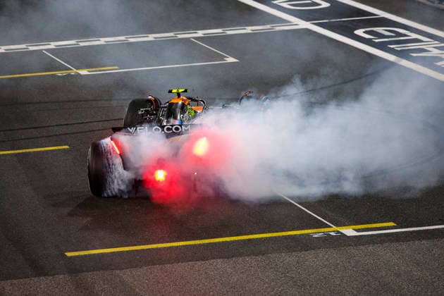 F1 - ABU DHABI GRAND PRIX 2025 04 NORRIS Lando (gbr), McLaren F1 Team MCL39, action celebrates his first FIA Formula One Drivers World Championship, WM, Weltmeisterschaft 2025 with doughnuts during the 2025 Formula 1 Abu Dhabi Grand Prix, 24th round of the 2025 FIA Formula One World Championship from December 05 to 07, 2025 on the Yas Marina Circuit, in Abu Dhabi, United Arab Emirates - Abu DhabiUnited Arab Emirates  Copyright: xXavixBonillax