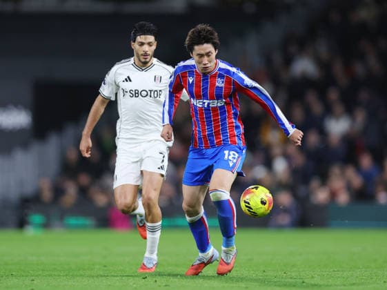 London, England, 7th December 2025. Raul JimÃ nez of Fulham (l) closes down Daichi Kamada of Crystal Palace (r) during the Fulham vs Crystal Palace Premier League match at Craven Cottage, London. Picture credit should read: David Klein Sportimage EDITORIAL USE ONLY. No use with unauthorised audio, video, data, fixture lists, club league logos or live services. Online in-match use limited to 120 images, no video emulation. No use in betting, games or single club league player publications. SPI_031_DK_Fulham_Palace SPI-4355-0030