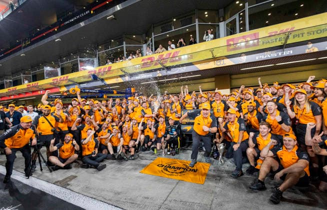 FORMULA ONE ABU DHABI GRAND PRIX 2025 Lando Norris 4 (GBR), McLaren MCL39 celebrates winning the drivers championship and Zak Brown, CEO McLaren Racing runs to escape the champagne during Race Day at the Formula One Etihad Airways Abu Dhabi Grand Prix 2025 at the Yas Marina Circuit, Yas Island, United Arab Emirates on 7 December 2025 Credit: Phil Duncan Every Second Media Editorial use only. All images are copyright Every Second Media Limited. No images may be reproduced without prior permission. Copyright: xIMAGO EveryxSecondxMediax ESM-1695-0049 PhilxDuncanx xEveryxSecondxMediax