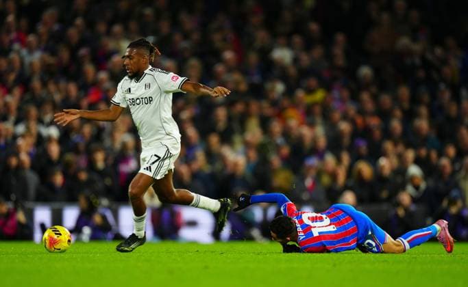 Alex Iwobi of Fulham gets away from a grounded Yeremi Pino of Crystal Palace Fulham v Crystal Palace, Premier League, Football, Craven Cottage, London, UK - 07 Dec 2025London Craven Cottage United Kingdom EDITORIAL USE ONLY No use with unauthorised audio, video, data, fixture lists, club league logos or live services. Online in-match use limited to 120 images, no video emulation. No use in betting, games or single club league player publications. Copyright: xJavierxGarcia Shutterstockx 16009431as