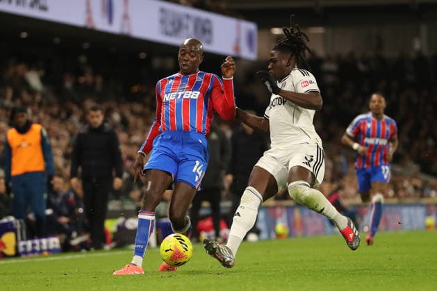 7th December 2025; Craven Cottage, Fulham, London, England; Premier League Football, Fulham versus Crystal Palace; Jean-Philippe Mateta of Crystal Palace and Calvin Bassey of Fulham  KatiexChan
