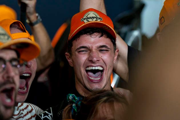 December 7, 2025, Abu Dhabi, United Arab Emirates: British driver LANDO NORRIS (McLaren F1 Team) celebrates with his team after claiming the 2025 FIA Formula 1 World Championship, WM, Weltmeisterschaft at Yas Marina Circuit in Abu Dhabi, United Arab Emirates. Abu Dhabi United Arab Emirates - ZUMAg147 20251207_fap_g147_064 Copyright: xJamesxGasperottix