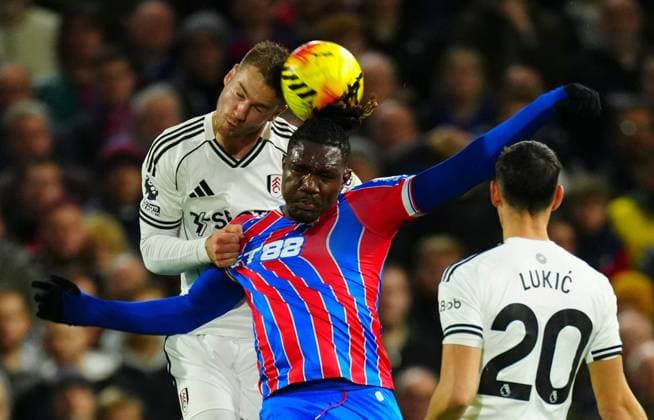 Joachim Andersen of Fulham battles with Chrisantus Uche of Crystal Palace Fulham v Crystal Palace, Premier League, Football, Craven Cottage, London, UK - 07 Dec 2025London Craven Cottage United Kingdom EDITORIAL USE ONLY No use with unauthorised audio, video, data, fixture lists, club league logos or live services. Online in-match use limited to 120 images, no video emulation. No use in betting, games or single club league player publications. Copyright: xJavierxGarcia Shutterstockx 16009431bq