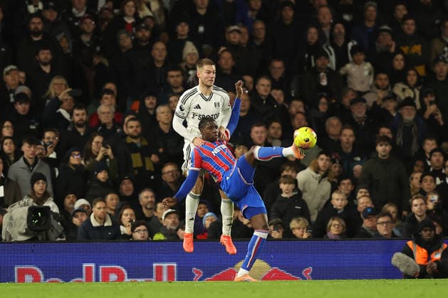 7th December 2025; Craven Cottage, Fulham, London, England; Premier League Football, Fulham versus Crystal Palace; Jaydee Canvot of Crystal Palace clears under pressure from Joachim Andersen of Fulham  KatiexChan