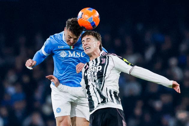 SSC Napoli vs Juventus Napoli s Kosovar defender Amir Rrahmani challenges for the ball with juventus Turkish forward Kenan YÄ±ldÄ±z during the Serie A football match between SSC Napoli vs Juventus at the Diego Armando Maradona Stadium in Naples, on December 07, 2025. _BPH4853_1 Copyright: xAntonioxBalascox