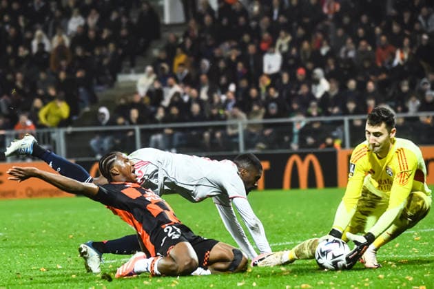 FOOTBALL : FC Lorient vs Olympique Lyonnais - Ligue 1 - JournÃ e 15 - 07 12 2025 Dermane Karim (FC Lorient) Clinton Mata (OL) Dominik Greif (OL) LorientFrance  Copyright: xBaptistexAutissierx