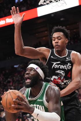 December 7, 2025, Toronto, On, CAN: Boston Celtics centre Neemias Queta (88) looks to shoot as Toronto Raptors forward Scottie Barnes (4) defends during second half NBA, Basketball Herren, USA basketball action in Toronto on Sunday, December 7, 2025. Neemias Queta; Scottie Barnes  - ZUMAc35_ 20251207_zaf_c35_089 Copyright: xChrisxYoungx