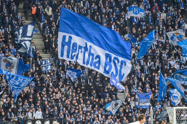 GER, Berlin, soccer, Hertha BSC vs. 1. FC Magdeburg, DFB, 2nd Bundesliga, 2025 2026 season, f.l.t.r.: fans of Hetha, the Hertha fans raise their scarves and celebrate the team, flags and banner, DFB DFL REGULATIONS PROHIBIT ANY USE OF PHOTOGRAPHS AS IMAGE SEQUENCES AND OR QUASI-VIDEO, December 7, 2025, Copyright: HMBxMedia UwexKoch