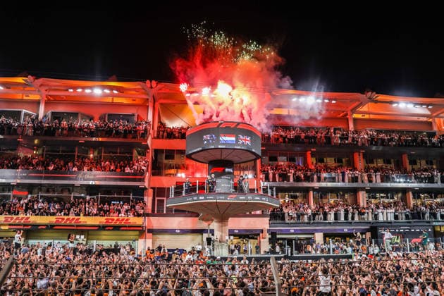 December 7, 2025, Abu Dhabi, United Arab Emirates: F1 World Drivers Champion and Third placed Lando Norris of McLaren celebrates on the podium during fireworks after Formula 1 Abu Dhabi Grand Prix at Yas Marina Circuit on December 7th, 2025 in Abu Dhabi, United Arab Emirates. Abu Dhabi United Arab Emirates - ZUMAz156 20251207_zip_z156_028 Copyright: xBeataxZawrzelx Abu Dhabi United Arab Emirates - ZUMA0842 20251207_zip_z156_028 Copyright: xIMAGO BeataxZawrzelx