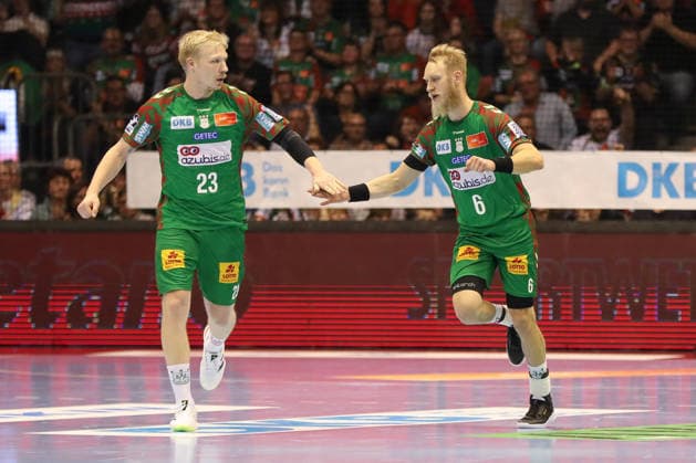 07.12.2025, xgox, Handball - Daikin HBL SC Magdeburg - FRISCH AUF! Göppingen emspor, v.l. Magnus Saugstrup (Magdeburg, 23), Matthias Musche (Magdeburg, 6) Jubel, Torjubel, jubelt ueber das Tor, celebrate the goal, celebration Magdeburg
