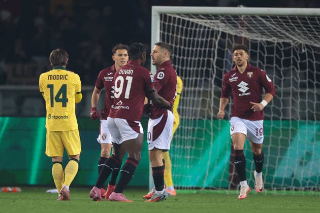 Turin, Italy, 8th December 2025. Nikola Vlasic of Torino FC celebrates with team mates after scoring a penalty to give the hosts a 1-0 lead during the Torino vs AC Milan Serie A match at Stadio Grande Torino, Turin. Picture credit should read: Jonathan Moscrop Sportimage EDITORIAL USE ONLY. No use with unauthorised audio, video, data, fixture lists, club league logos or live services. Online in-match use limited to 120 images, no video emulation. No use in betting, games or single club league player publications. SPI_006_JM_TORO_MILAN SPI-4323-0006