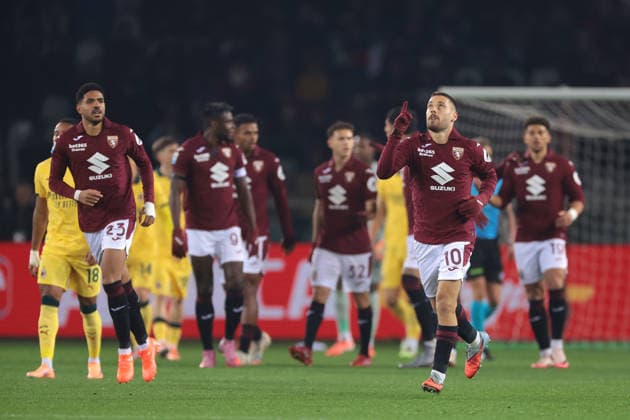 Turin, Italy, 8th December 2025. Nikola Vlasic of Torino FC celebrates with team mates after scoring a penalty to give the hosts a 1-0 lead during the Torino vs AC Milan Serie A match at Stadio Grande Torino, Turin. Picture credit should read: Jonathan Moscrop Sportimage EDITORIAL USE ONLY. No use with unauthorised audio, video, data, fixture lists, club league logos or live services. Online in-match use limited to 120 images, no video emulation. No use in betting, games or single club league player publications. SPI_014_JM_TORO_MILAN SPI-4323-0014