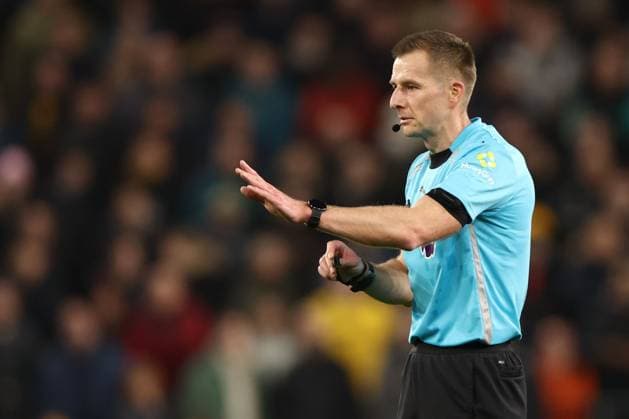 Referee Mr Michael Salisbury Wolverhampton Wanderers v Manchester United, ManU Premier League, Football, Molineux, Wolverhampton, UK - 08 Dec 2025Wolverhampton Molineux United Kingdom EDITORIAL USE ONLY No use with unauthorised audio, video, data, fixture lists, club league logos or live services. Online in-match use limited to 120 images, no video emulation. No use in betting, games or single club league player publications. Copyright: xRyanxBrowne Shutterstockx 16009503dl