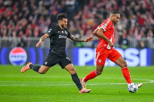 Luis Suarez (Sporting CP) und Jonathan Tah (FC Bayern München) battle for the ball during the UEFA Champions League 2025 26 League Phase MD6 match between FC Bayern München and Sporting Clube de Portugal at Football Arena Munich on December 9, 2025 in Munich, Germany. (Photo by xxx DeFodi Images)