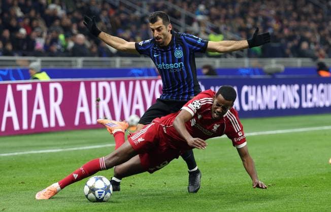 Alexander Isak of Liverpool is fouled by Henrikh Mkhitaryan of Inter Milan Inter Milan v Liverpool, UEFA Champions League, Group Stage, Football, San Siro Stadium, Milan, Italy- 09 Dec 2025Milan San Siro Italy EDITORIAL USE ONLY No use with unauthorised audio, video, data, fixture lists, club league logos or live services. Online in-match use limited to 120 images, no video emulation. No use in betting, games or single club league player publications. Copyright: xKieranxMcManus Shutterstockx 16009887t