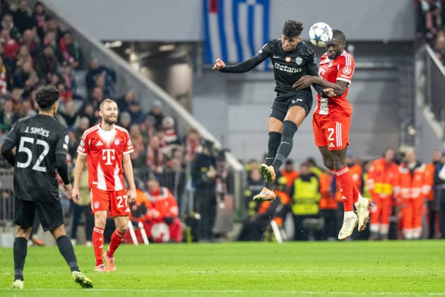 Dayot Upamecano 2 (FC Bayern Muenchen) Kopfball im Zweikampf, FC Bayern Muenchen vs. Sporting Clube de Portugal, Fussball, UEFA Champions League, 6. Spieltag, 09.12.2025 DFB regulations prohibit any use of photographs as image sequences and or quasi-video Muenchen Bayern Deutschland