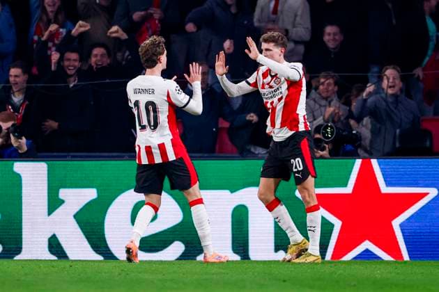Guus Til of PSV Eindhoven celebrates with teammates after scoring his teams first goal PSV Eindhoven v Atletico de Madrid, UEFA Champions League 2025 26 League Phase MD6, PSV Eindhoven v Atletico de Madrid, PSV Stadion, December 9, 2025, Eindhoven, Netherlands.