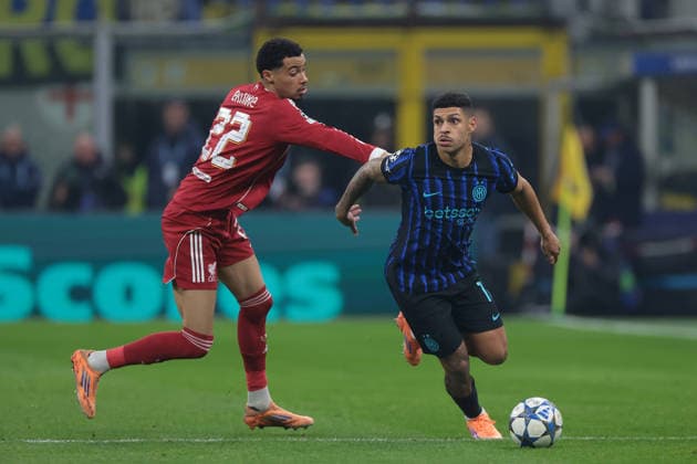Milan, Italy, 9th December 2025. Luis Henrique of FC Internazionale is pursued by Hugo Ekitike of Liverpool FC during the Internazionale vs Liverpool UEFA Champions League match at Giuseppe Meazza, Milan. Picture credit should read: Jonathan Moscrop Sportimage EDITORIAL USE ONLY. No use with unauthorised audio, video, data, fixture lists, club league logos or live services. Online in-match use limited to 120 images, no video emulation. No use in betting, games or single club league player publications. SPI_024_JM_INTER_LIVERPOOL_UCL SPI-4324-0024