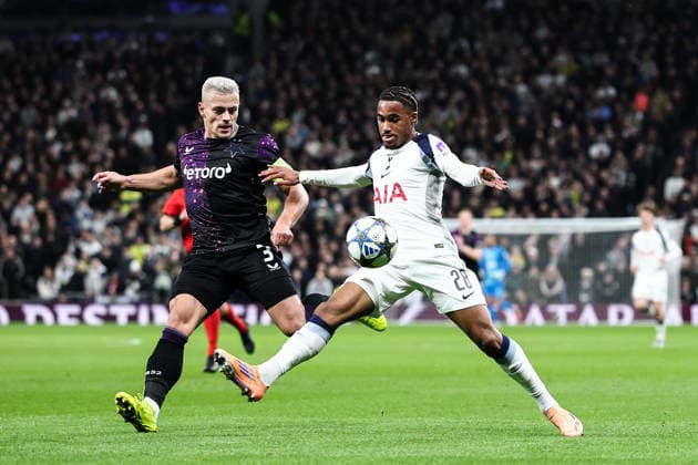 London, England, 9th December 2025. Wilson Odobert of Tottenham holds off Tomas Holes of Slavia Prague during the Tottenham Hotspur vs Slavia Prague UEFA Champions League match at the Tottenham Hotspur Stadium, London. Picture credit should read: David Klein Sportimage EDITORIAL USE ONLY. No use with unauthorised audio, video, data, fixture lists, club league logos or live services. Online in-match use limited to 120 images, no video emulation. No use in betting, games or single club league player publications. SPI_019_DK_TOT_SLA SPI-4359-0021