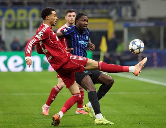 December 9, 2025, Milan, MILAN: Liverpool s Hugo EkitikÃ (L) challenges for the ball with Inter Milan™s Marcus Thuram during the UEFA Champions League match between Inter Milan and Liverpool at Giuseppe Meazza stadium in Milan, 9 December 2025..ANSA MATTEO BAZZI. Soccer; UEFA Champions League: Inter Vs Liverpool  - ZUMAa110 20251209_zaf_a110_047 Copyright: xMatteoxBazzix