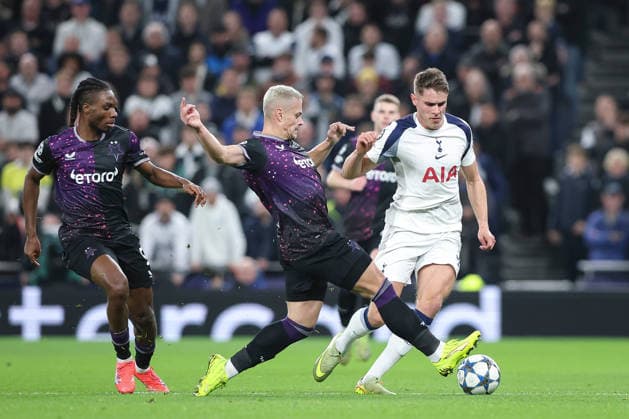 9th December 2025; Tottenham Hotspur Stadium, London, England; UEFA Champions League Football, Tottenham Hotspur versus Slavia Prague; Tomas Holes of Slavia Prague tackles Micky van de Ven of Tottenham Hotspur  IanxStephen