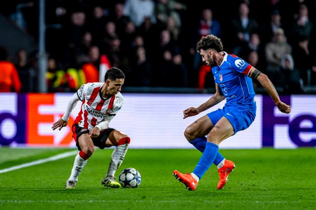 PSV Eindhoven defender Mauro Junior, Atletico de Madrid defender Matteo Ruggeri, during the match PSV Eindhoven vs Atletico de Madrid at the Philips stadium for the Champions League - League phase - Matchday 6 season 2025-2026 in EINDHOVEN, Netherlands on 9 December 2025, (photo by Stefan Koops EYE4images DeFodi Images)
