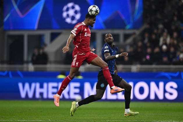 CALCIO - UEFA Champions League - Inter - FC Internazionale vs Liverpool FC Ryan Gravenberch of Liverpool F.C. and Marcus Thuram of F.C. Inter are in action during the UEFA Champions League phase day 6 football match between F.C. Inter ad Liverpool F.C. at the San Siro Stadium on December 9, 2025 in Milan, Italy. Milano Italy  Copyright: xIPAxSport ABACAx