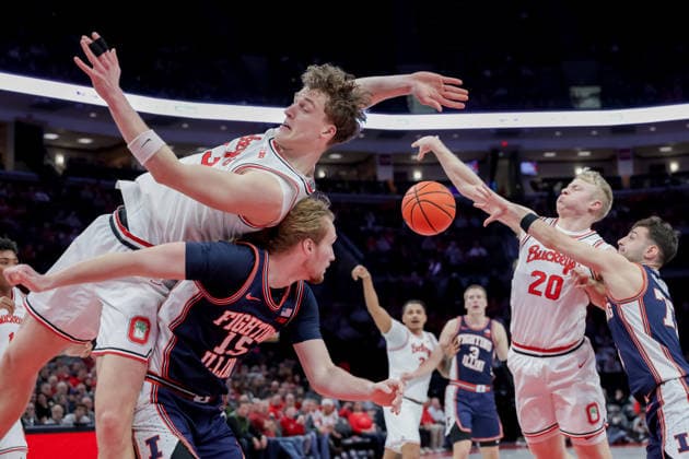 December 9, 2025, Columbus, Ohio, USA: Ohio State Buckeyes center CHRISTOPH TILLY (13) gets caught on the back of Illinois Fighting Illini forward JAKE DAVIS (15) going for a rebound during the game between the Illinois Fighting Illini and the Ohio State Buckeyes at Value City Arena. Columbus USA - ZUMAs304 20251209_zaf_s304_041 Copyright: xScottxStuartx