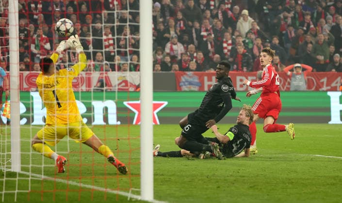 (251210) -- MUNICH, Dec. 10, 2025 -- Lennart Karl (1st R) of Bayern Munich shoots to score during the UEFA Champions League football match between Bayern Munich and Sporting CP in Munich, Germany, Dec. 9, 2025. (Photo by Xinhua) (SP)GERMANY-MUNICH-FOOTBALL-UEFA CHAMPIONS LEAGUE-BAYERN MUNICH VS SPORTING CP PhilippexRuiz 