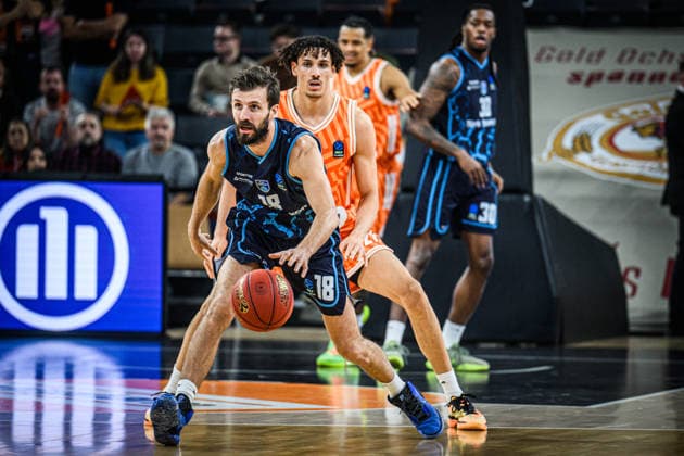 Dogus Ozdemiroglu (Turk Telekom Ankara) und Alec Anigbata (ratiopharm ulm) battle for the ball during the Basketball Eurocup match between ratiopharm ulm and Turk Telekom Ankara at ratiopharm Arena on December 10, 2025 in Neu-Ulm, Germany. (Photo by Harry Langer DeFodi Images)