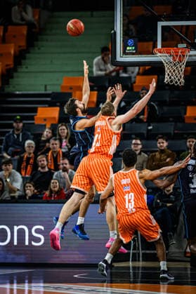 Dogus Ozdemiroglu (Turk Telekom Ankara), Christian Sengfelder (ratiopharm ulm) und Mark Smith (ratiopharm ulm) battle for the ball during the Basketball Eurocup match between ratiopharm ulm and Turk Telekom Ankara at ratiopharm Arena on December 10, 2025 in Neu-Ulm, Germany. (Photo by Harry Langer DeFodi Images)