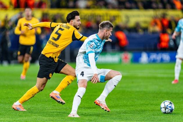 10.12.2025, Borussia Dortmund vs. FK Bodo Glimt, UEFA Champions League, 6.Spieltag Ramy Bensebaini (Borussia Dortmund, 5) Odin Luras Bjortuft (FK Bodo Glimt 4) Regulations prohibit any use of photographs as image sequences and or quasi video Copyright: xBahhoxKarax