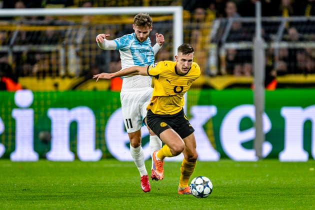 Borussia Dortmund defender Nico Schlotterbeck, Bodo Glimt forwarder Ole Didrik Blomberg, during the match Borussia Dortmund vs FK Bodo Glimt at the BVB Stadion Dortmund for the Champions League - League phase - Matchday 6 season 2025-2026 in DORTMUND, Germany on 10 December 2025, (photo by Stefan Koops EYE4images DeFodi Images)