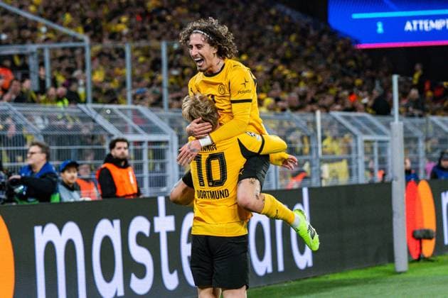10.12.2025, Borussia Dortmund vs. FK Bodo Glimt, UEFA Champions League, 6.Spieltag Tor zum 1:0 durch Julian Brandt (Borussia Dortmund, 10) hier mit Fabio Silva (Borussia Dortmund, 21) Regulations prohibit any use of photographs as image sequences and or quasi video Copyright: xBahhoxKarax