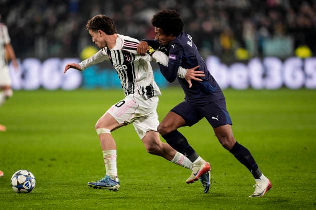 Juventus™s Kenan Yildiz fights for the ball with Pafos™ Bruno Felipe during the Uefa Champions League soccer match, between Juventus and Pafos at the Allianz Stadium in Turin, League phase Matchday 6, north west Italy - December 10, 2025. - Soccer  Copyright: xFabioxFerrari LaPressex