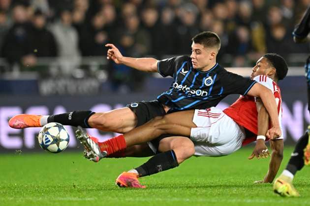 Club Brugge v Arsenal - UEFA Champions League BRUGGE, BELGIUM - DECEMBER 10 : Tresoldi Nicolo forward of Club Brugge and Lewis-Skelly Myles midfielder of Arsenal during the UEFA Champions League 2025 26 League Phase MD6 match between Club Brugge and Arsenal on December 10, 2025 in Brugge, Belgium, 10 12 2025 Brugge Belgium  Copyright: xNicoxVereeckenx