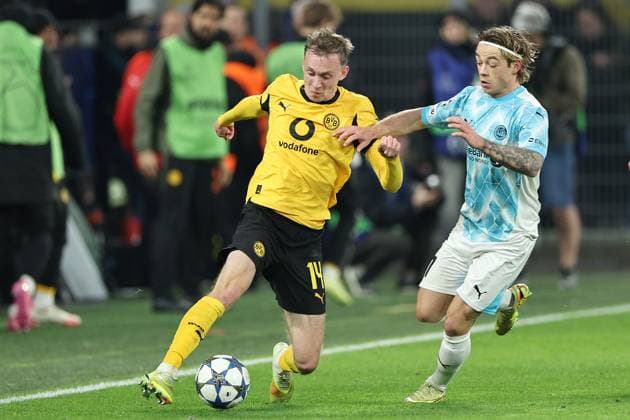 DORTMUND - (l-r) Maximilian Beier of Borussia Dortmund and Jens Petter Hauge of Bodo Glimt during the Champions League match between Borussia Dortmund and FK Bodo Glimt at Signal Iduna Park on December 10, 2025, in Dortmund, Germany. ANP Hollandse Hoogte Bart Stoutjesdijk UEFA Champions League 2025 26 xVIxANPxSportx xBartxStoutjesdijkxIVx 544522766 originalFilename: 544522766.jpg