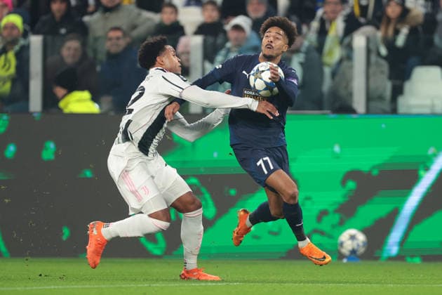 Turin, Italy, 10th December 2025. Weston McKennie of Juventus tussles with Joao Correia of Pafos FC during the Juventus vs Pafos FC UEFA Champions League match at Juventus Stadium, Turin. Picture credit should read: Jonathan Moscrop Sportimage EDITORIAL USE ONLY. No use with unauthorised audio, video, data, fixture lists, club league logos or live services. Online in-match use limited to 120 images, no video emulation. No use in betting, games or single club league player publications. SPI_033_JM_JUVE_PAFOS_UCL SPI-4325-0033