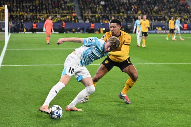 Jens Petter Hauge (FK Bodo Glimt) und Jobe Bellingham (Borussia Dortmund) im Zweikampf waehrend des Spiels der UEFA Champions League 2025 26, 6. Spieltag Ligaphase zwischen Borussia Dortmund und FK Bodo Glimt, BVB Stadion am 10. December 2025 in Dortmund, Deutschland. (Foto von Ralf Treese DeFodi Images) +++ Jens Petter Hauge (FK Bodo Glimt) und Jobe Bellingham (Borussia Dortmund) battle for the ball during the UEFA Champions League 2025 26 League Phase MD6 match between Borussia Dortmund and FK Bodo Glimt at BVB Stadion Dortmund on December 10, 2025 in Dortmund, Germany. (Photo by Ralf Treese DeFodi Images)