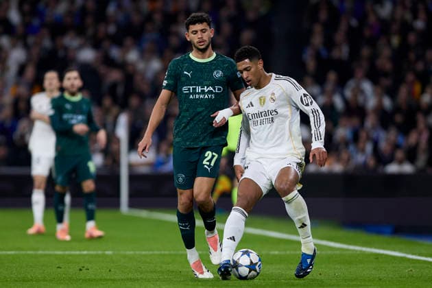 December 10, 2025, Madrid, Madrid, Spain: Jude Bellingham of Real Madrid CF and Matheus Nunes of Manchester City FC during the UEFA Champions League football match between Real Madrid CF and Manchester City FC at Santiago Bernabeu Stadium in Madrid, Spain, december 10, 2025 Madrid Spain - ZUMAa206 20251210_zsp_a206_024 Copyright: xRubenxAlbarranx
