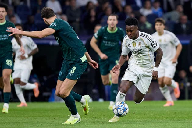 December 10, 2025, Madrid, Madrid, Spain: Vinicius Jr of Real Madrid CF and Ruben Dias of Manchester City FC during the UEFA Champions League football match between Real Madrid CF and Manchester City FC at Santiago Bernabeu Stadium in Madrid, Spain, december 10, 2025 Madrid Spain - ZUMAa206 20251210_zsp_a206_028 Copyright: xRubenxAlbarranx