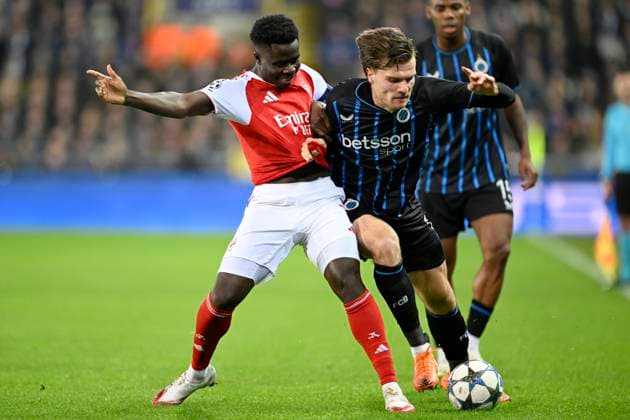 Club Brugge v Arsenal - UEFA Champions League BRUGGE, BELGIUM - DECEMBER 10 : Saka Bukayo forward of Arsenal and Meijer Bjorn defender of Club Brugge during the UEFA Champions League 2025 26 League Phase MD6 match between Club Brugge and Arsenal on December 10, 2025 in Brugge, Belgium, 10 12 2025 Brugge Belgium  Copyright: xNicoxVereeckenx