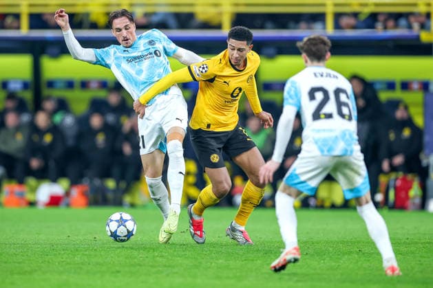10.12.2025, Fußball, UEFA Champions League, Borussia Dortmund - FK Bodö Glimt, BVB Stadion, 5. Spieltag, Saison 2025 2026: Andreas Helmersen (Bodo Glimt 21) im Zweikampf gegen Jobe Bellingham (BVB 07) Regulations prohibit any use of photographs as image sequences and or quasi-video. Nordrhein-Westfalen Deutschland