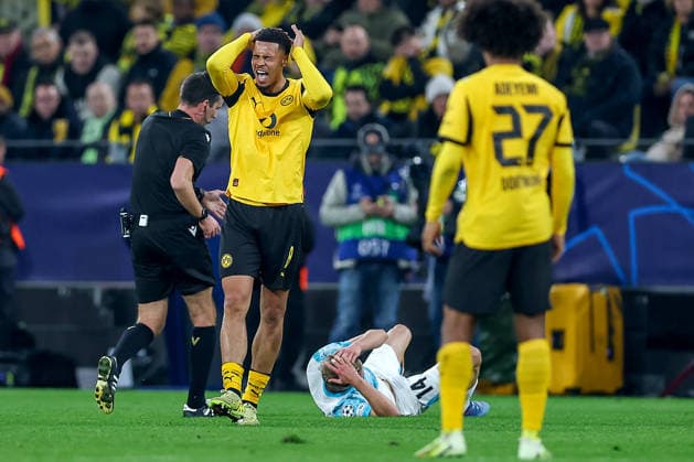 10.12.2025, Fußball, UEFA Champions League, Borussia Dortmund - FK Bodö Glimt, BVB Stadion, 5. Spieltag, Saison 2025 2026: Felix Nmecha (BVB 08) gestikulierend auf dem Spielfeld neben dem am Boden liegenden Ulrik Saltnes (Bodo Glimt 14) Regulations prohibit any use of photographs as image sequences and or quasi-video. Nordrhein-Westfalen Deutschland